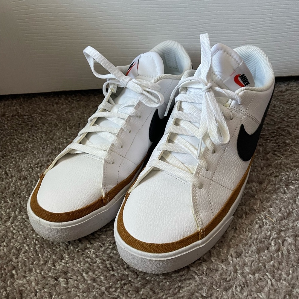 Nike White Sneakers with Black Swoosh